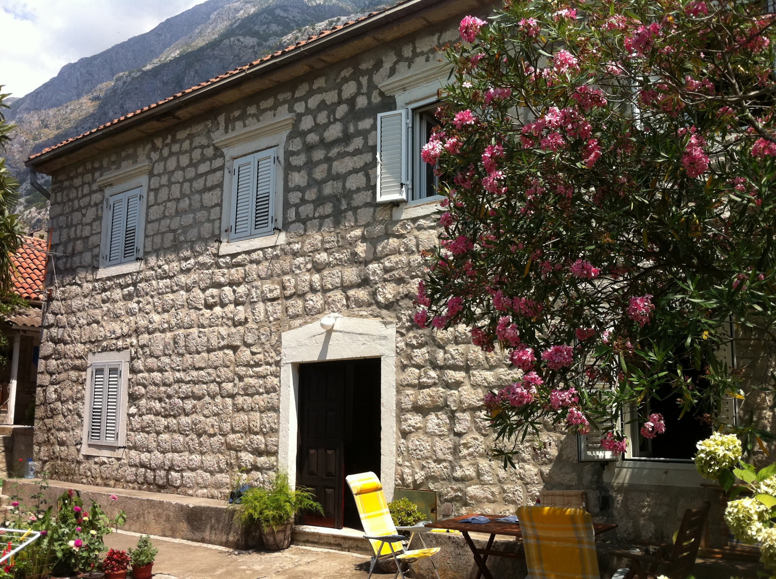 Semi-detached waterfront stone house in Dobrota