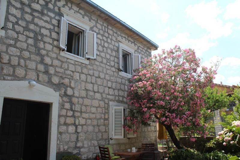 Semi-detached waterfront stone house in Dobrota