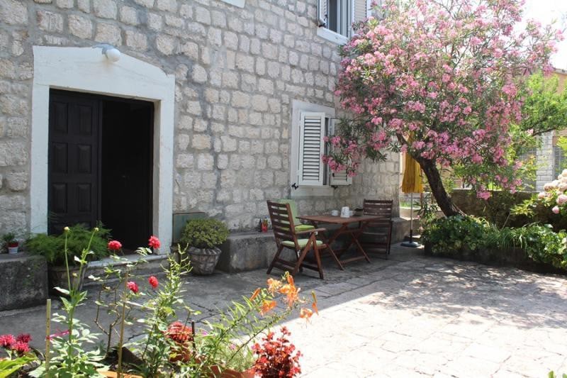 Semi-detached waterfront stone house in Dobrota