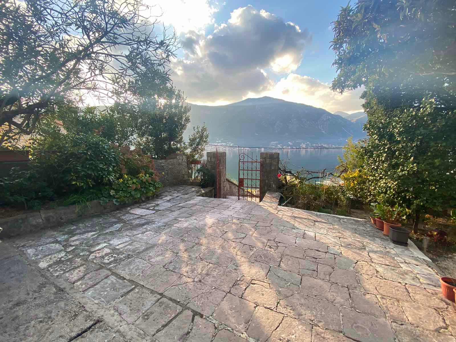 Semi-detached waterfront stone house in Dobrota