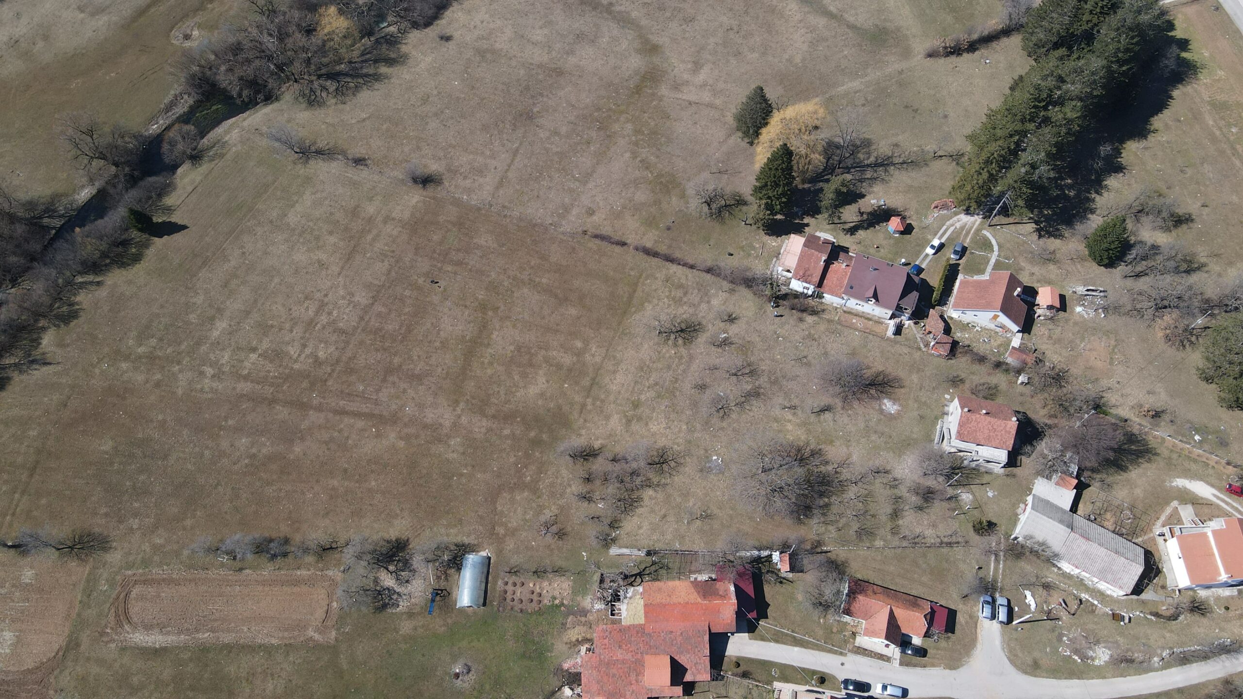 Farmland with architectural plans and river access